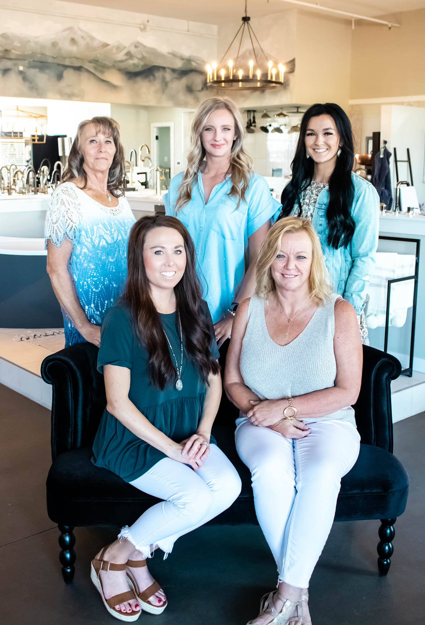 Colorado Winsupply Showroom Team - Melissa Rasico The team members stand together outside the lakeside shop, smiling and showcasing their friendly atmosphere.