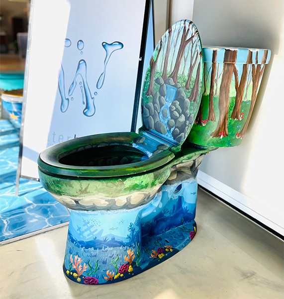 Maria Mauder transformed this toilet into a forest and deep sea for a toilet-painting contest by Waterhouse Bath and Kitchen Studio in Perrysburg for World Toilet Day